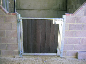 Stable door with plastic wood infill.